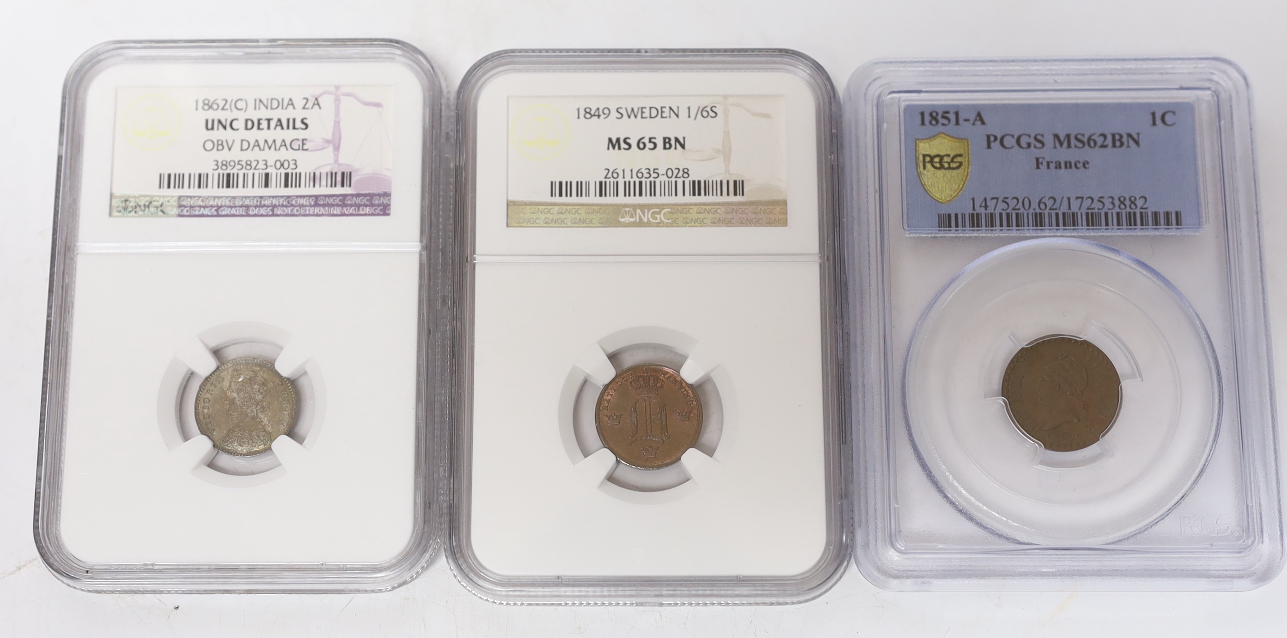 Russia One rouble 1893, ANACS graded VF 35, British India 2 Annas 1862 (C), NGC graded UNC, damage to obverse, Guatemala quarter real, 1819 G, NGC graded MS 65 (the highest graded example by NGC), Sweden 1/6 skilling 184